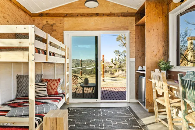 a view of balcony with wooden floor