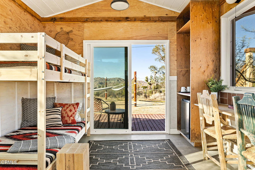7284 Saddleback Road Joshua Tree, CA 92252 - Photo 30 of 47 a view of balcony with wooden floor