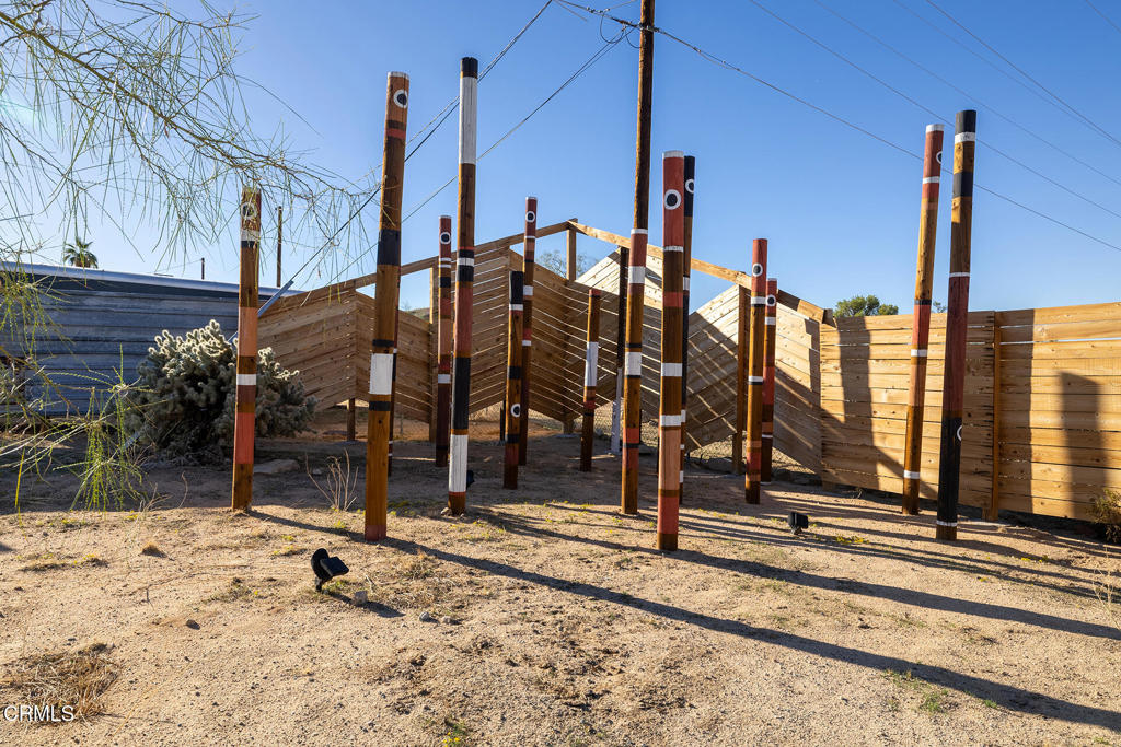 7284 Saddleback Road Joshua Tree, CA 92252 - Photo 35 of 47 a view of a house with a park