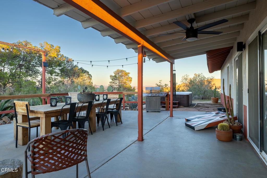 7284 Saddleback Road Joshua Tree, CA 92252 - Photo 37 of 47 a view of a porch with furniture