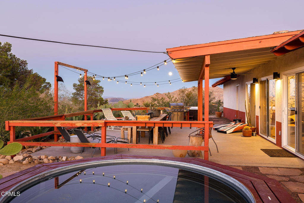 7284 Saddleback Road Joshua Tree, CA 92252 - Photo 40 of 47 a view of a balcony with chairs