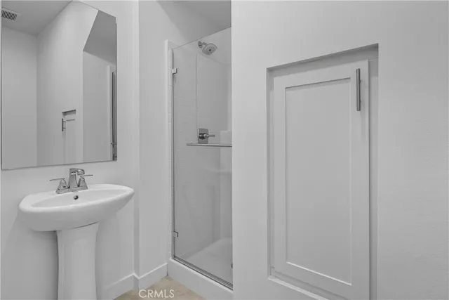 a view of a balcony with wooden floor