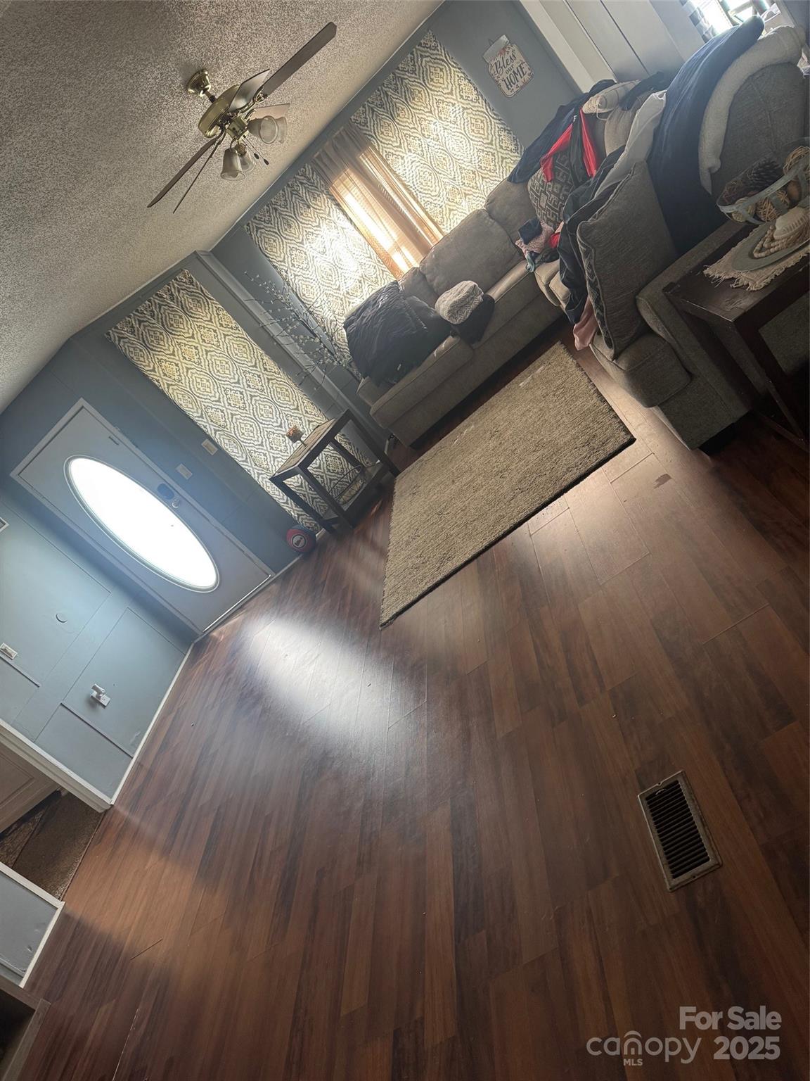 456 Cornelius Road Mooresville, NC 28117 - Photo 12 of 19 an empty room with wooden floor