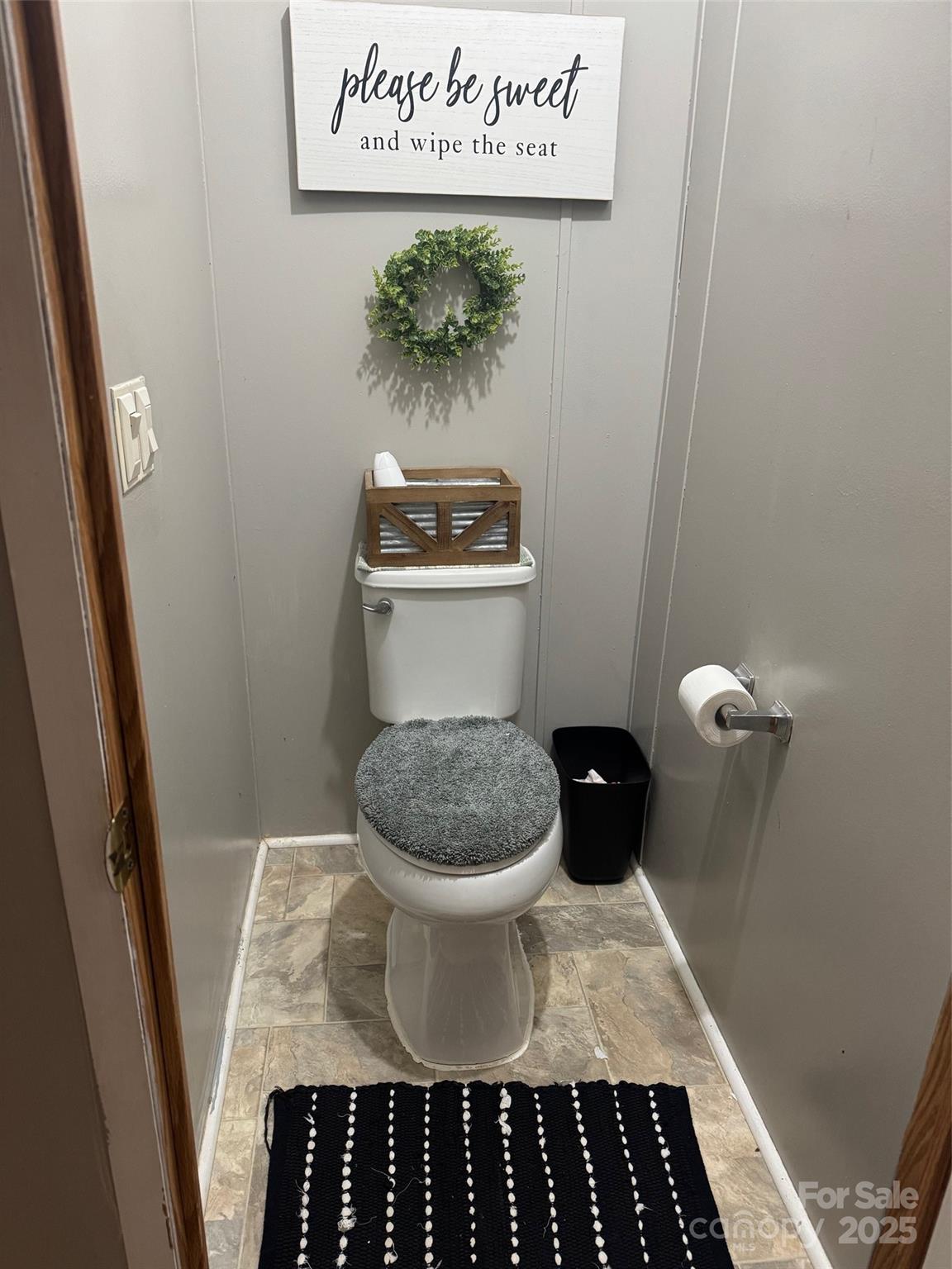 456 Cornelius Road Mooresville, NC 28117 - Photo 17 of 19 a bathroom with a toilet and a sink