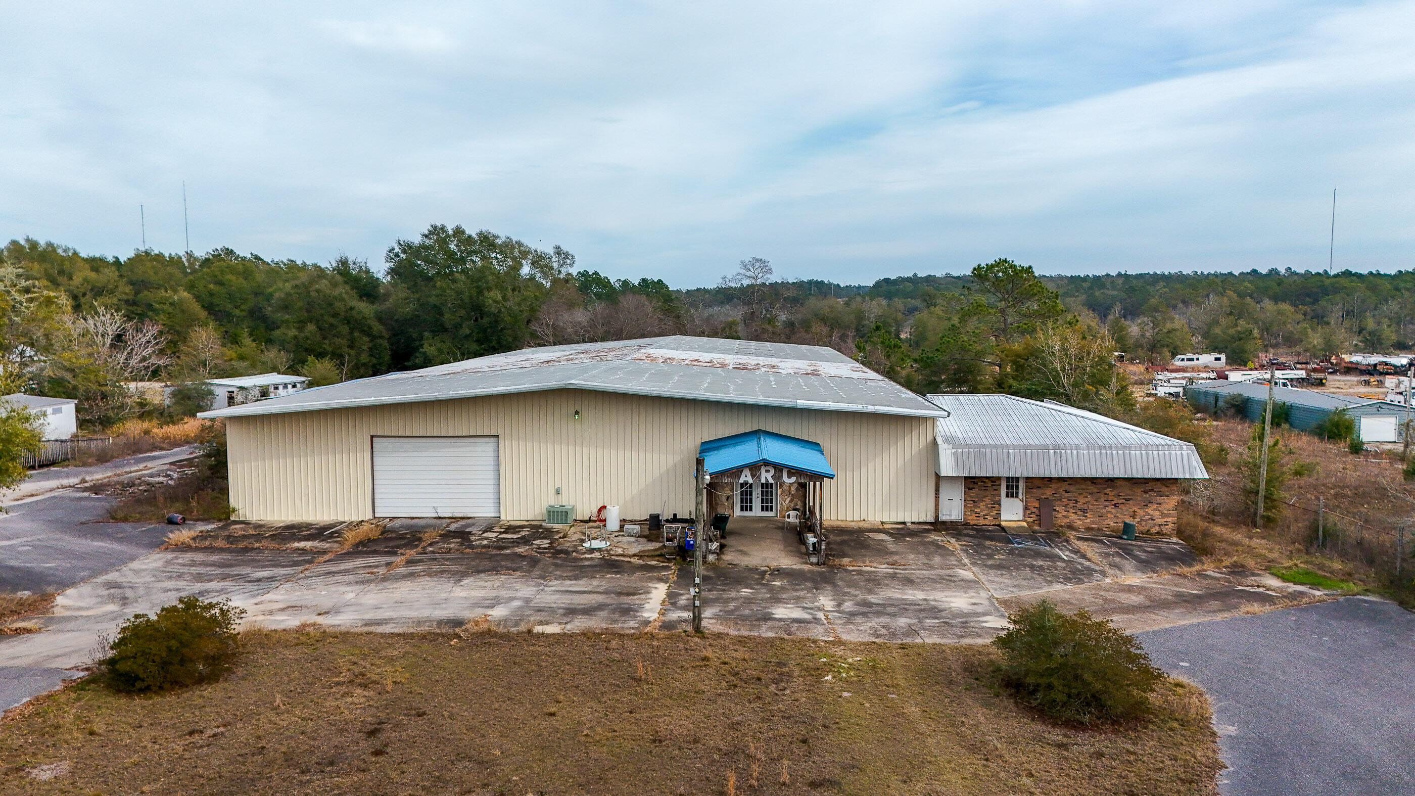 1408 Highway 83 DeFuniak Springs, FL 32433 - Photo 2 of 8 a view of a house with pool and sitting area