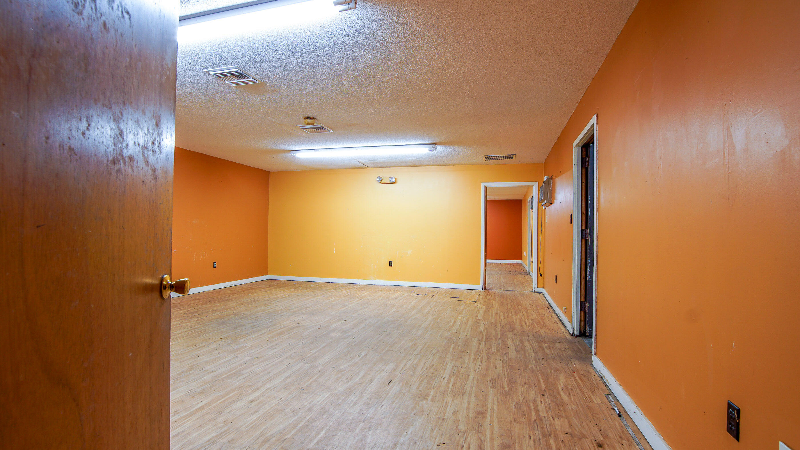 1408 Highway 83 DeFuniak Springs, FL 32433 - Photo 5 of 8 a view of empty room with wooden floor