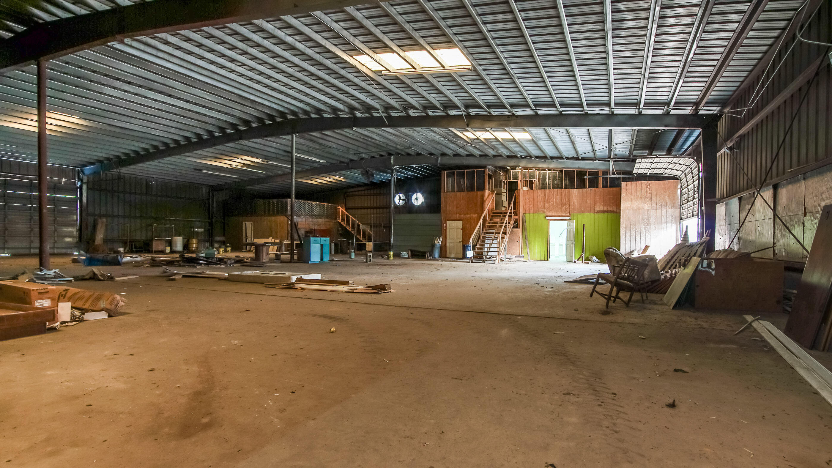 1408 Highway 83 DeFuniak Springs, FL 32433 - Photo 6 of 8 a view of garage with wooden table and chairs