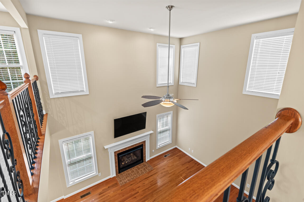6116 Tiffield Way Wake Forest, NC 27587 - Photo 18 of 39 a view of a livingroom with furniture wooden floor and window