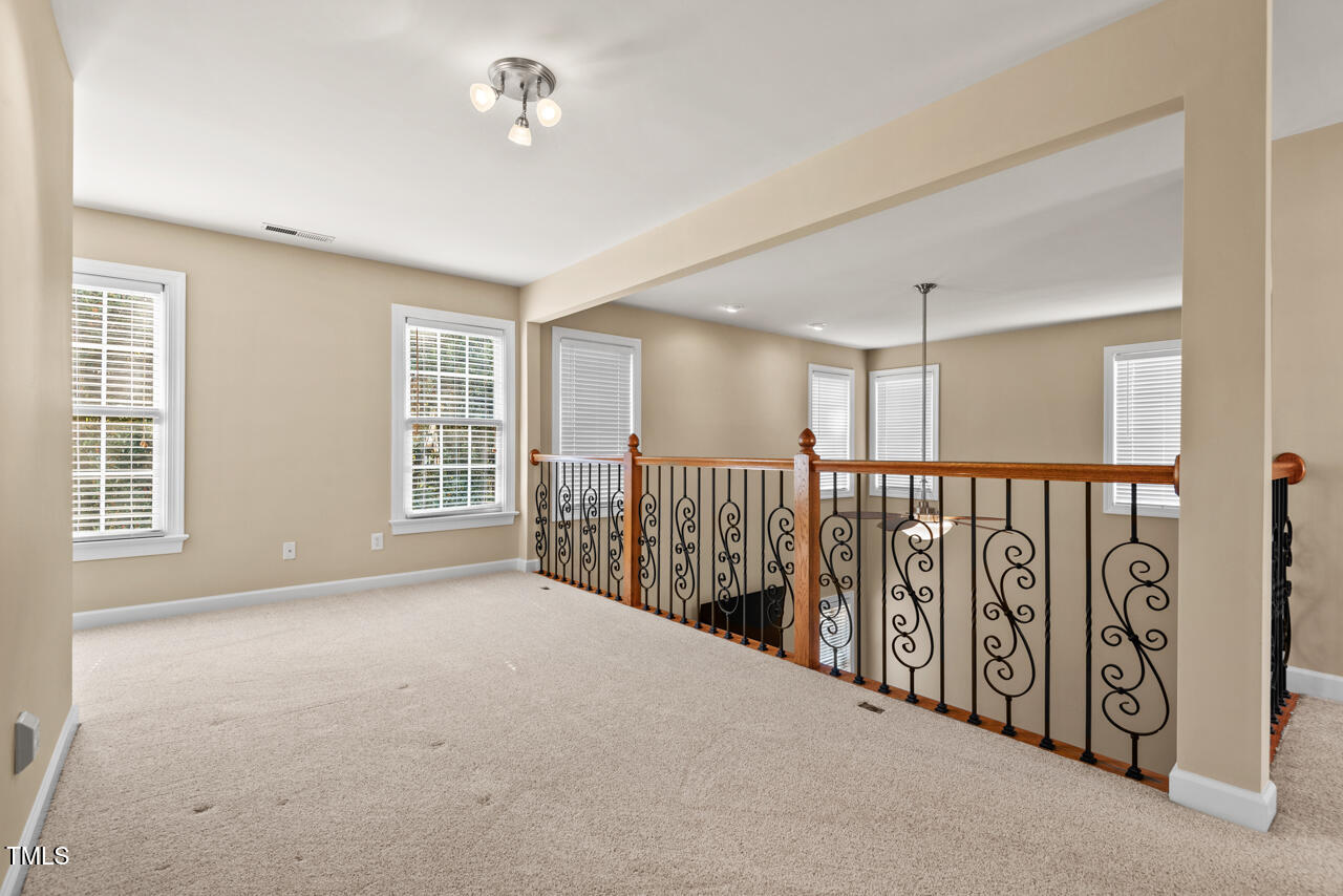 6116 Tiffield Way Wake Forest, NC 27587 - Photo 19 of 39 a view of an empty room with a window