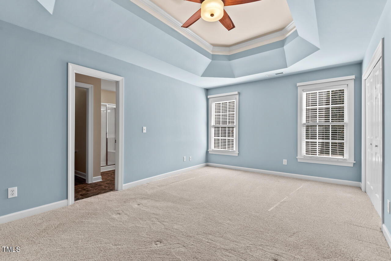 6116 Tiffield Way Wake Forest, NC 27587 - Photo 21 of 39 a view of an empty room with a window
