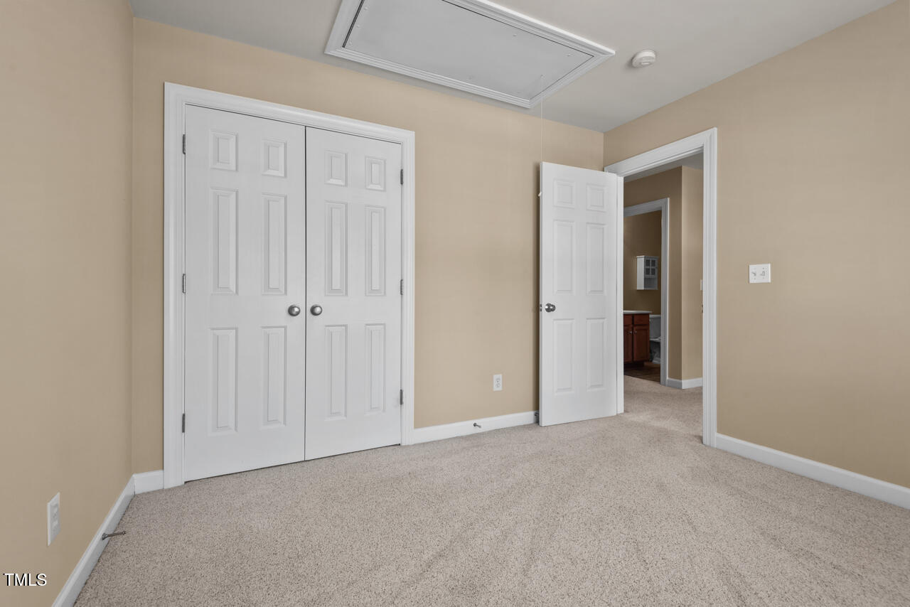 6116 Tiffield Way Wake Forest, NC 27587 - Photo 27 of 39 an empty room with closet area
