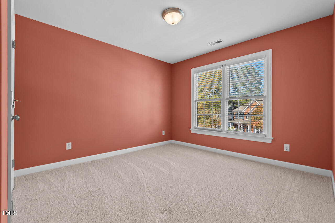 6116 Tiffield Way Wake Forest, NC 27587 - Photo 28 of 39 an empty room with windows