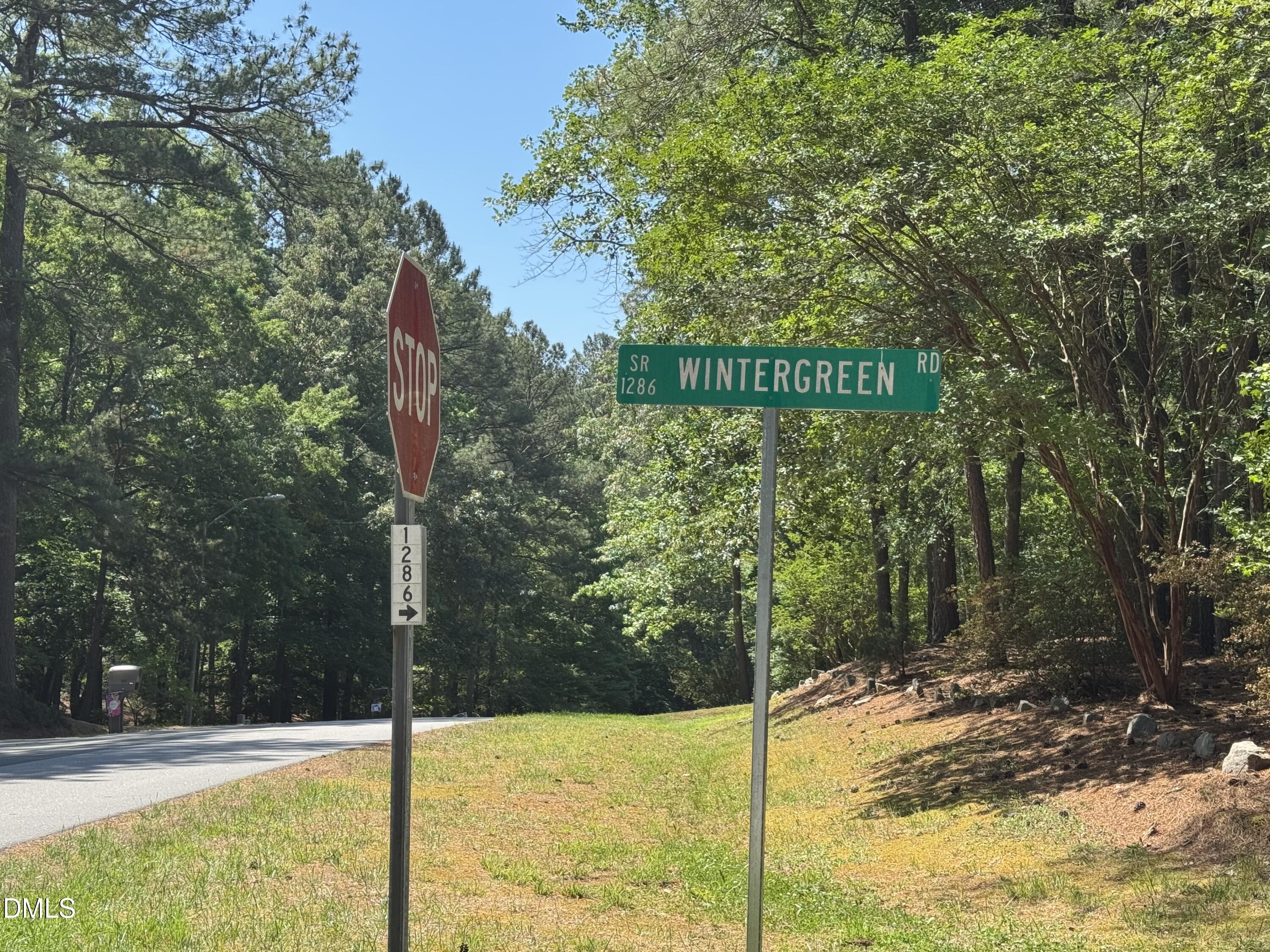 84 Wintergreen Road Henderson, NC 27537 - Photo 47 of 49 a view of a sign board