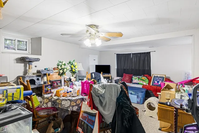 a view of a workspace with furniture