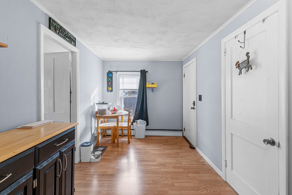 58 Read Avenue Coventry, RI 02816 - Photo 24 of 36 a view of a room with wooden floor and furniture