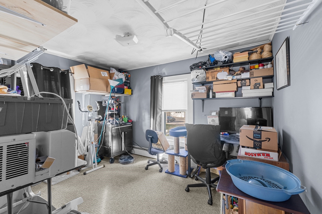 58 Read Avenue Coventry, RI 02816 - Photo 30 of 36 a view of a workspace with furniture and a window