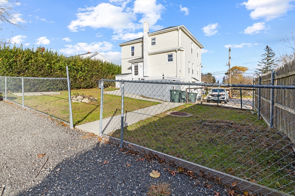 58 Read Avenue Coventry, RI 02816 - Photo 4 of 36 a view of a house with a backyard