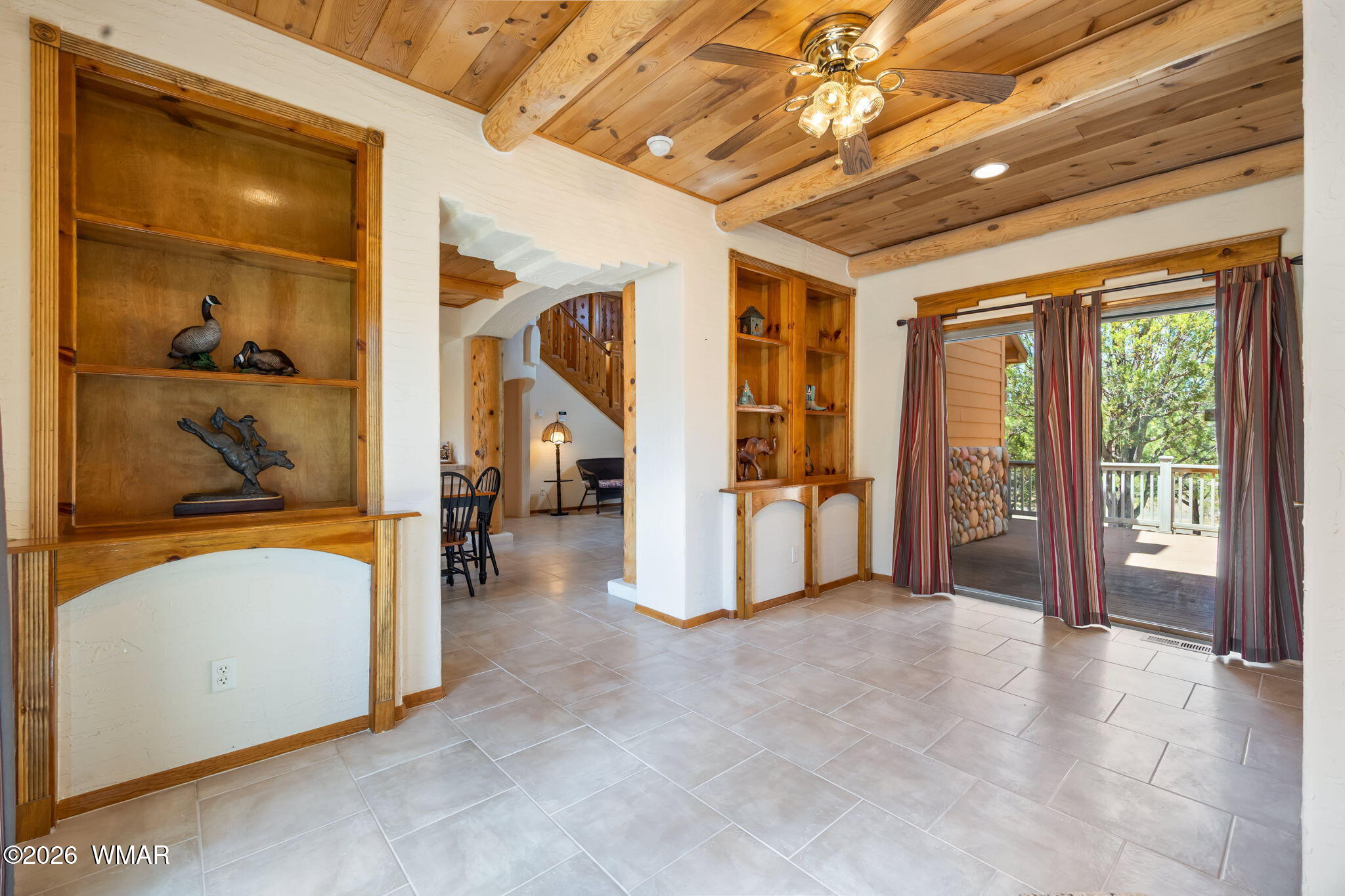 2937 Ransack Road Overgaard, AZ 85933 - Photo 12 of 34 a view of a big room with large windows