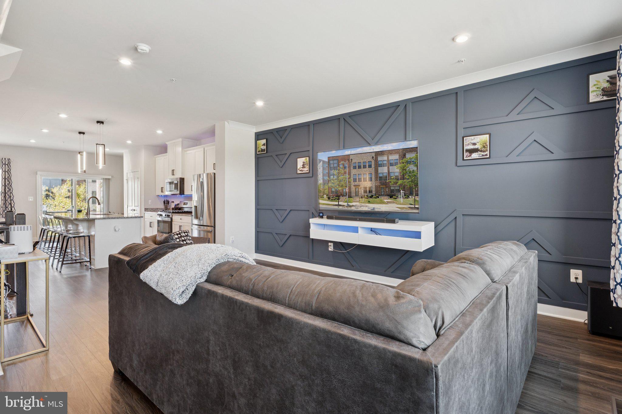 2823 Toles Park Drive Suitland, MD 20746 - Photo 11 of 46 a living room with furniture and a flat screen tv