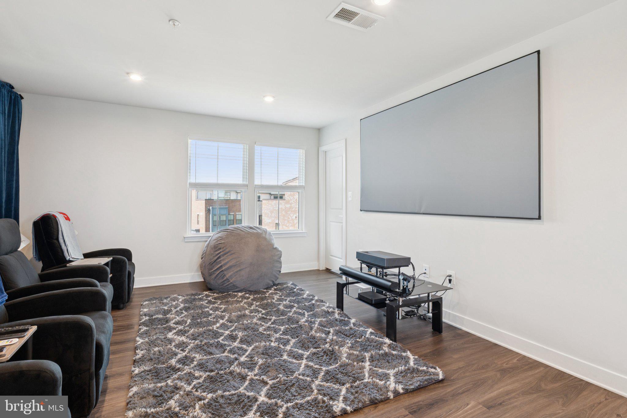 2823 Toles Park Drive Suitland, MD 20746 - Photo 27 of 46 a bedroom with furniture and a window