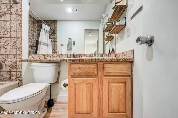 a view of swimming pool from a balcony