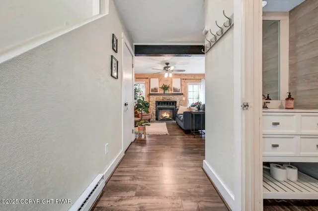 a kitchen with a sink and a refrigerator
