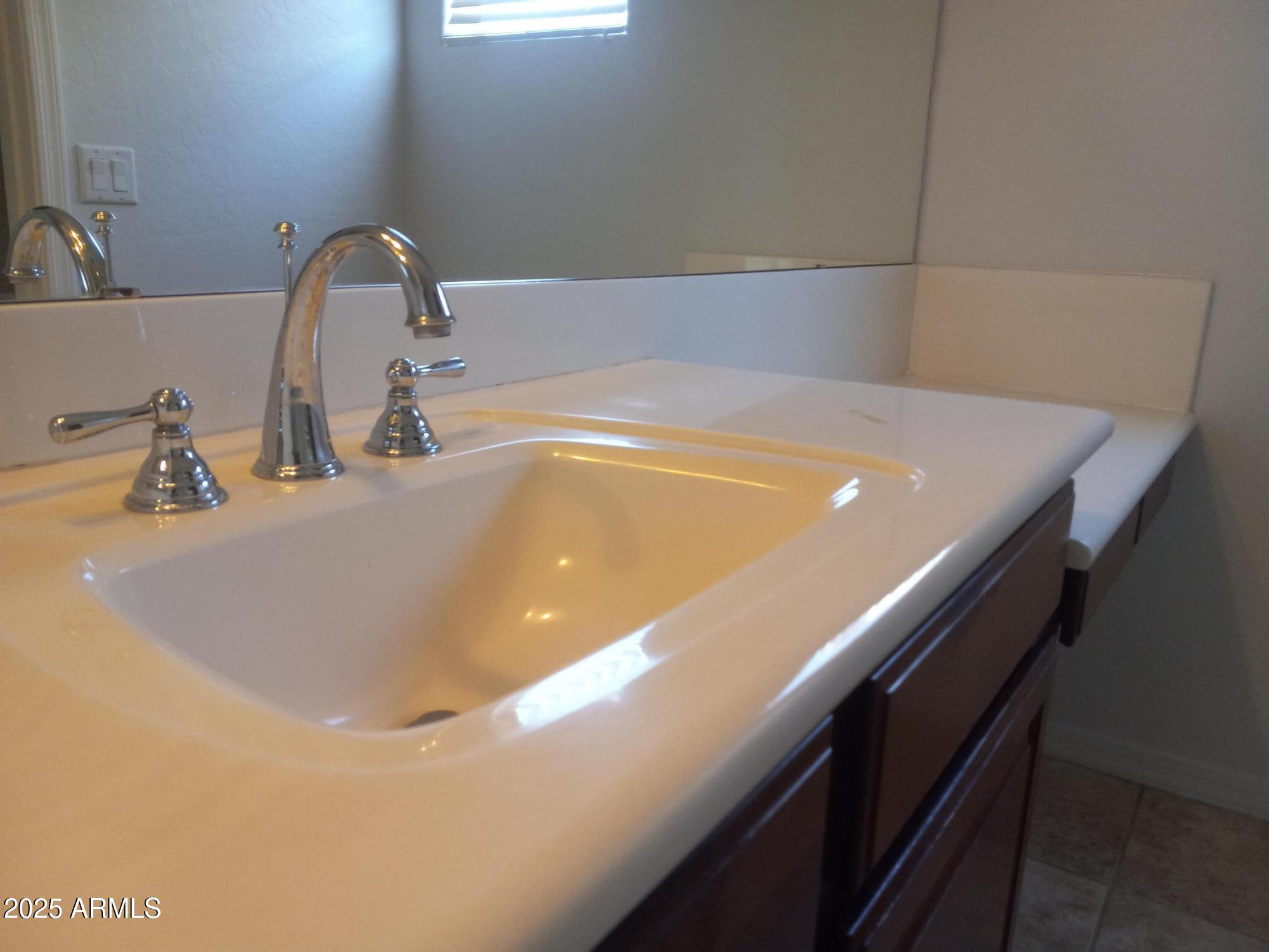 3947 West Roundabout Circle Chandler, AZ 85226 - Photo 21 of 32 a close up of a sink