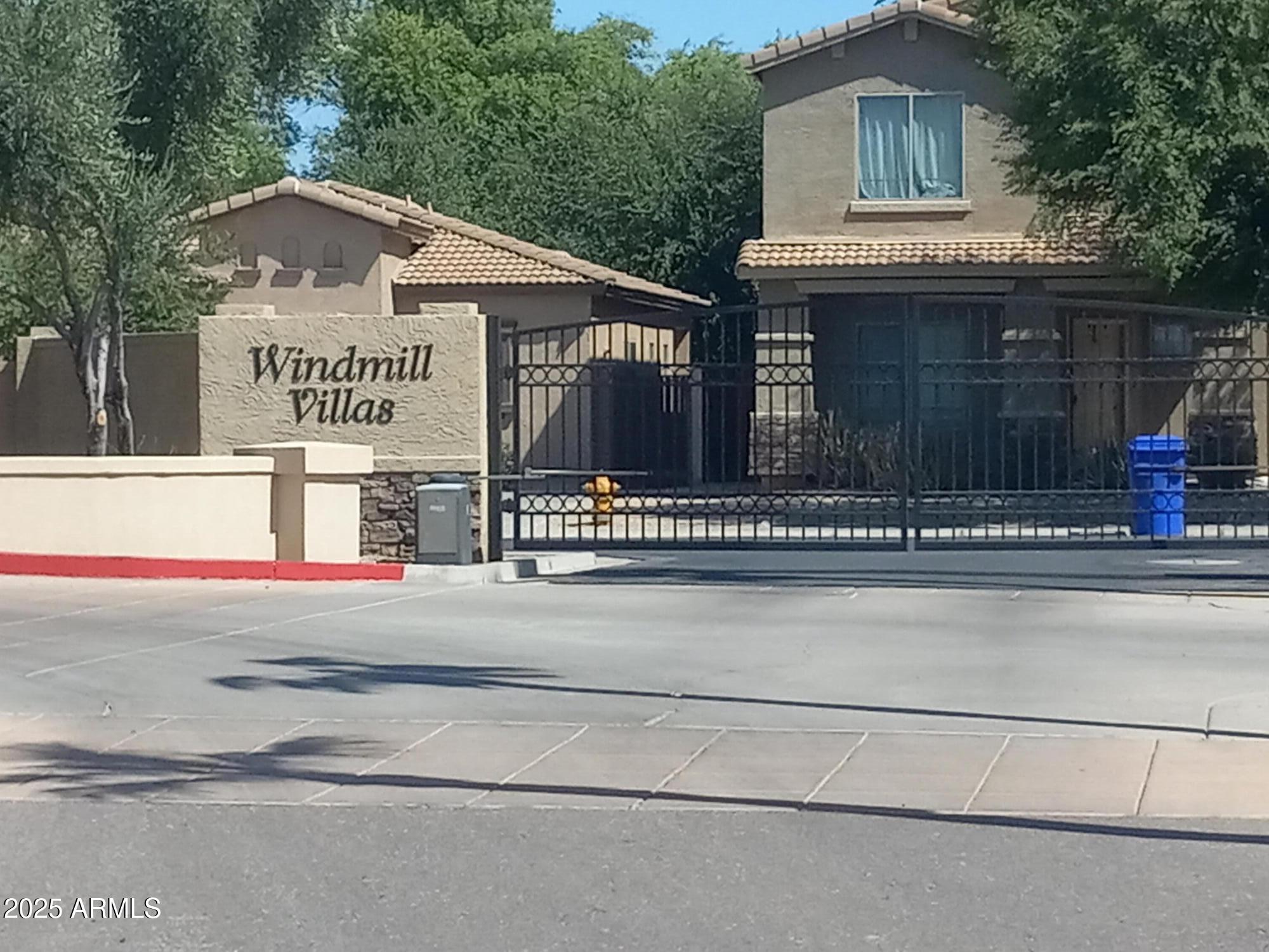 3947 West Roundabout Circle Chandler, AZ 85226 - Photo 7 of 32 a front view of a house with a garage