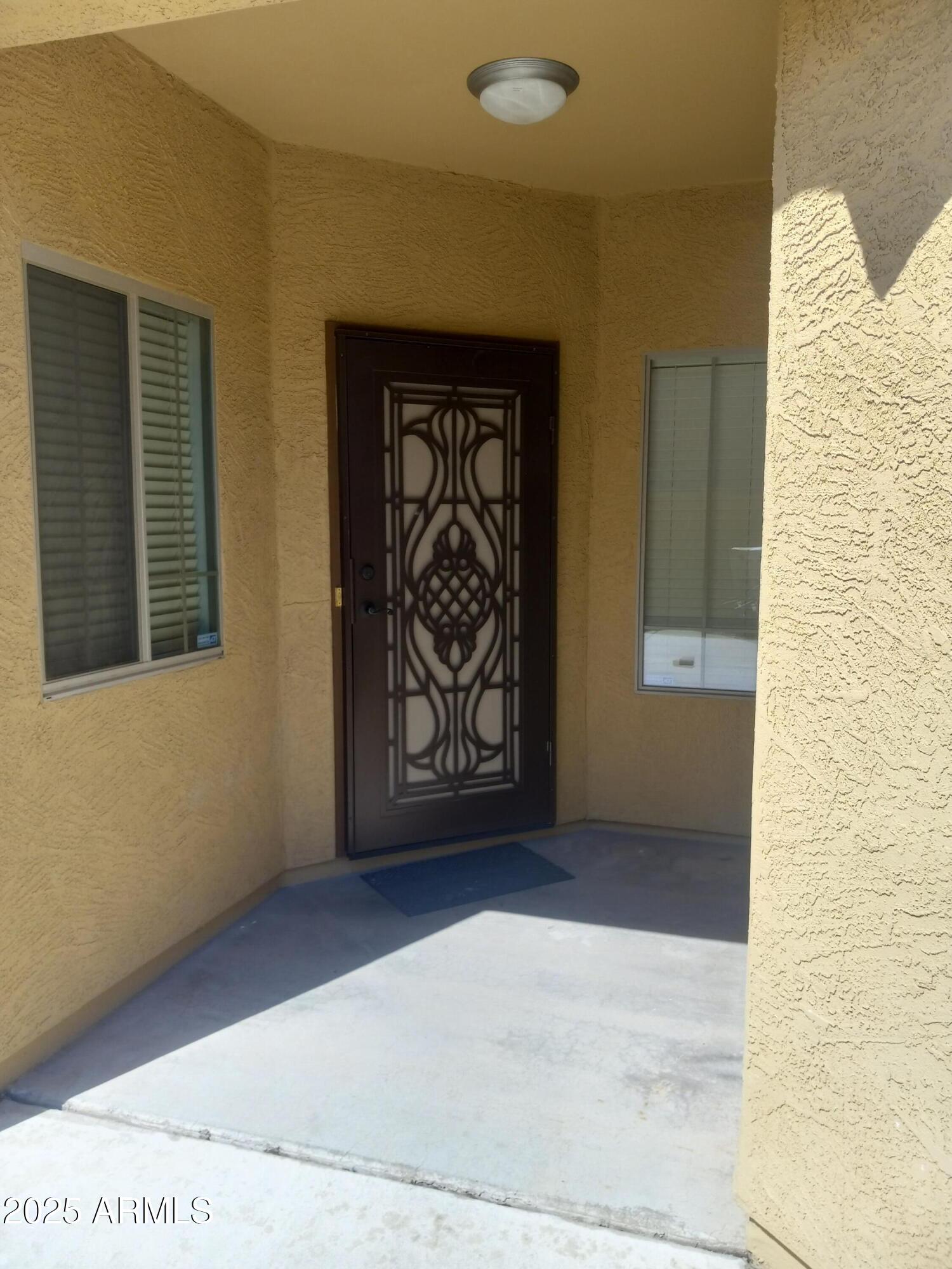 3947 West Roundabout Circle Chandler, AZ 85226 - Photo 8 of 32 a view of an front door