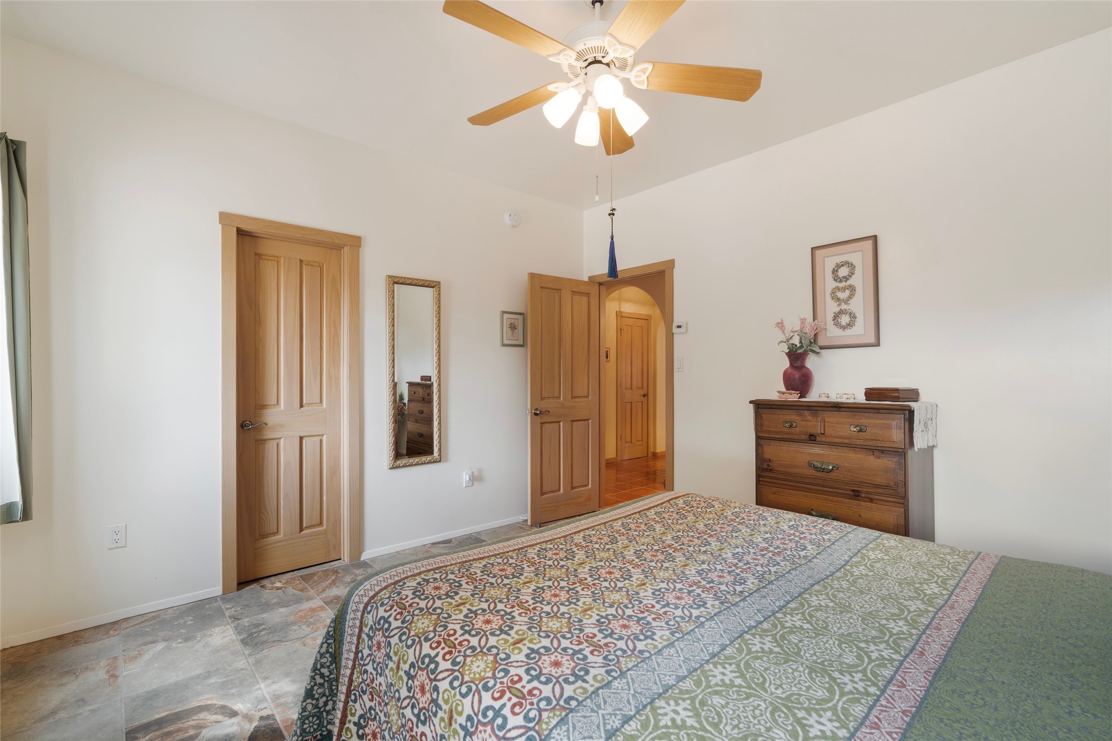 23 Descanso Road Santa Fe, NM 87508 - Photo 27 of 54 Guest bedroom one with slate-like tile floors