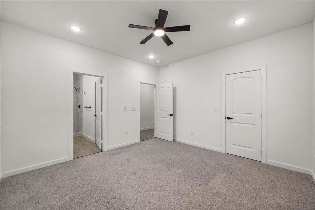 6771 Northwest County Road 1146 Barry, TX 75102 - Photo 23 of 34 a view of an empty room and a ceiling fan