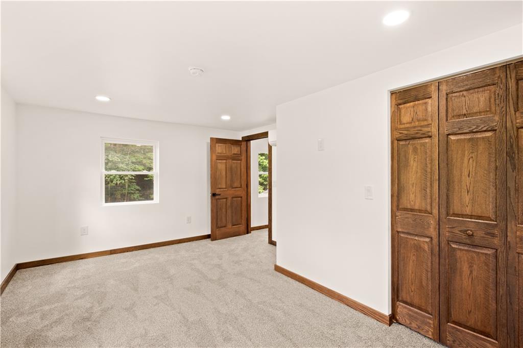 480 Freeman Falls Road Acme, PA 15610 - Photo 26 of 43 an empty room with windows