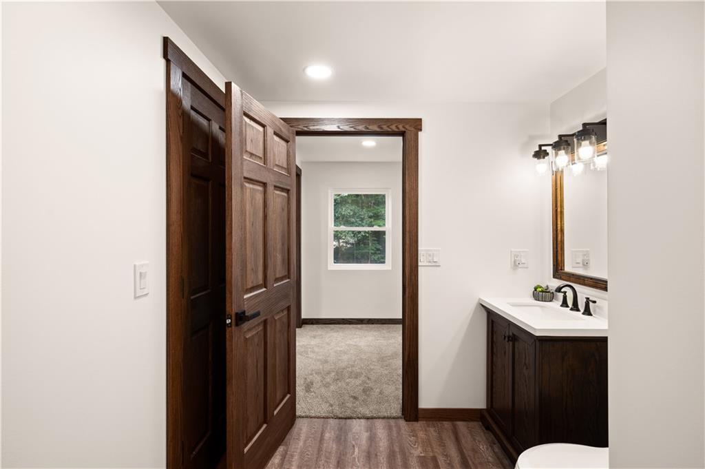 480 Freeman Falls Road Acme, PA 15610 - Photo 28 of 43 a bathroom with a sink mirror and toilet