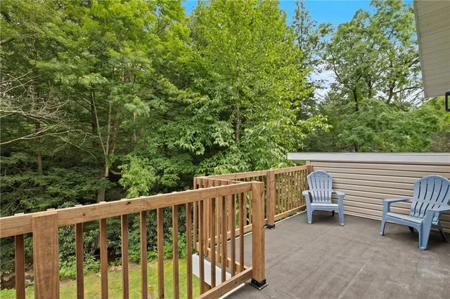 a view of a two chairs in the roof deck