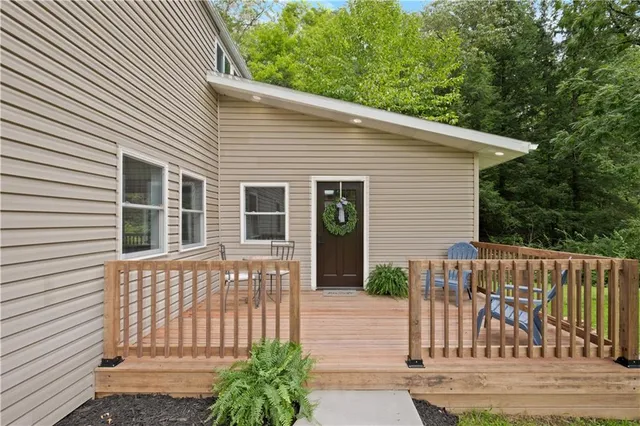 a view of a house with a small yard