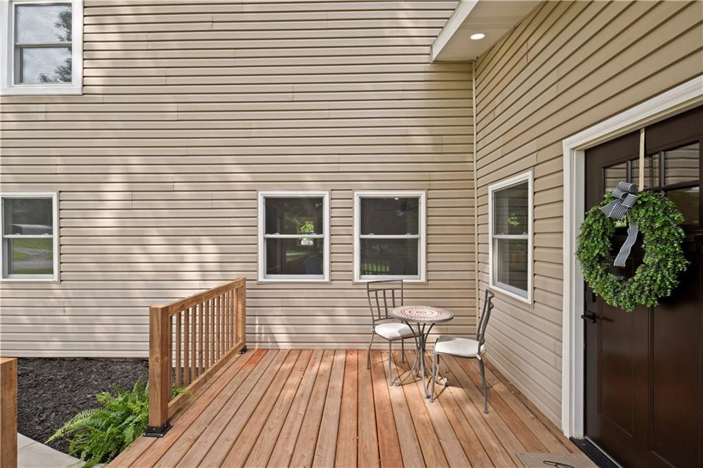 480 Freeman Falls Road Acme, PA 15610 - Photo 6 of 43 a view of a brick house with wooden floor