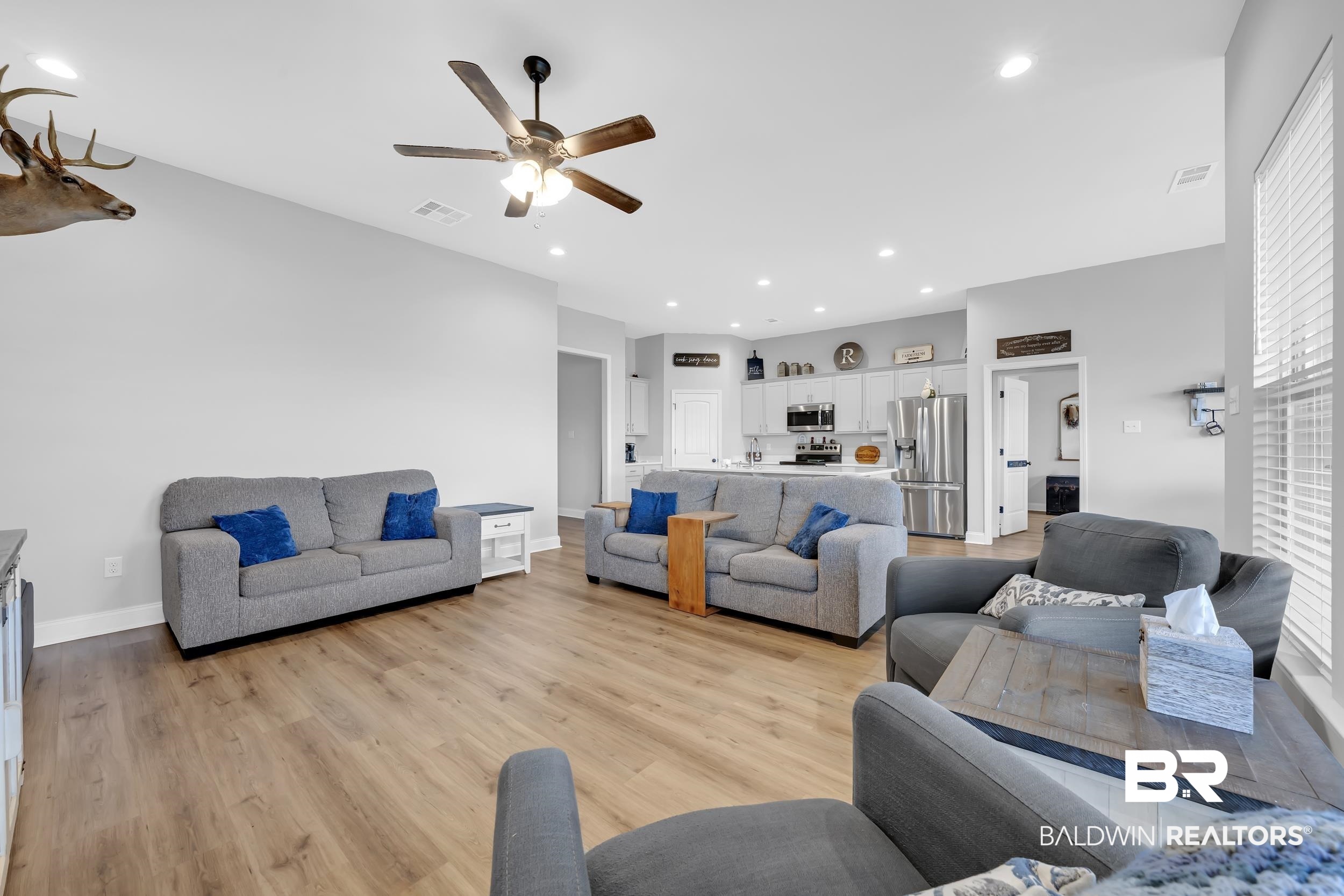 1176 Stella Road Foley, AL 36535 - Photo 8 of 40 Living area with light wood finished floors, recessed lighting, and ceiling fan