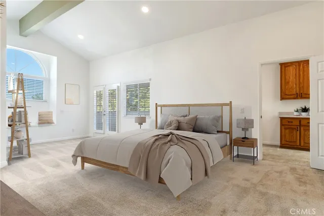 a bathroom with a shower sink and mirror