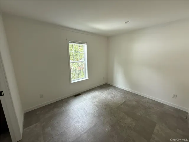 an empty room with an entryway