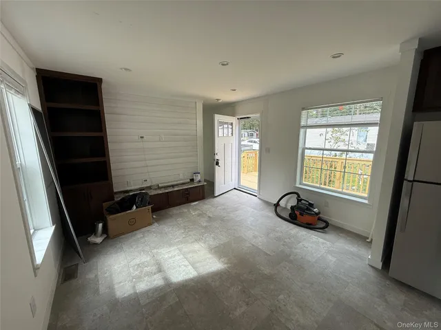 a view of room with a window and storage