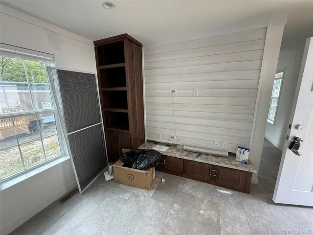 a room with window and closet