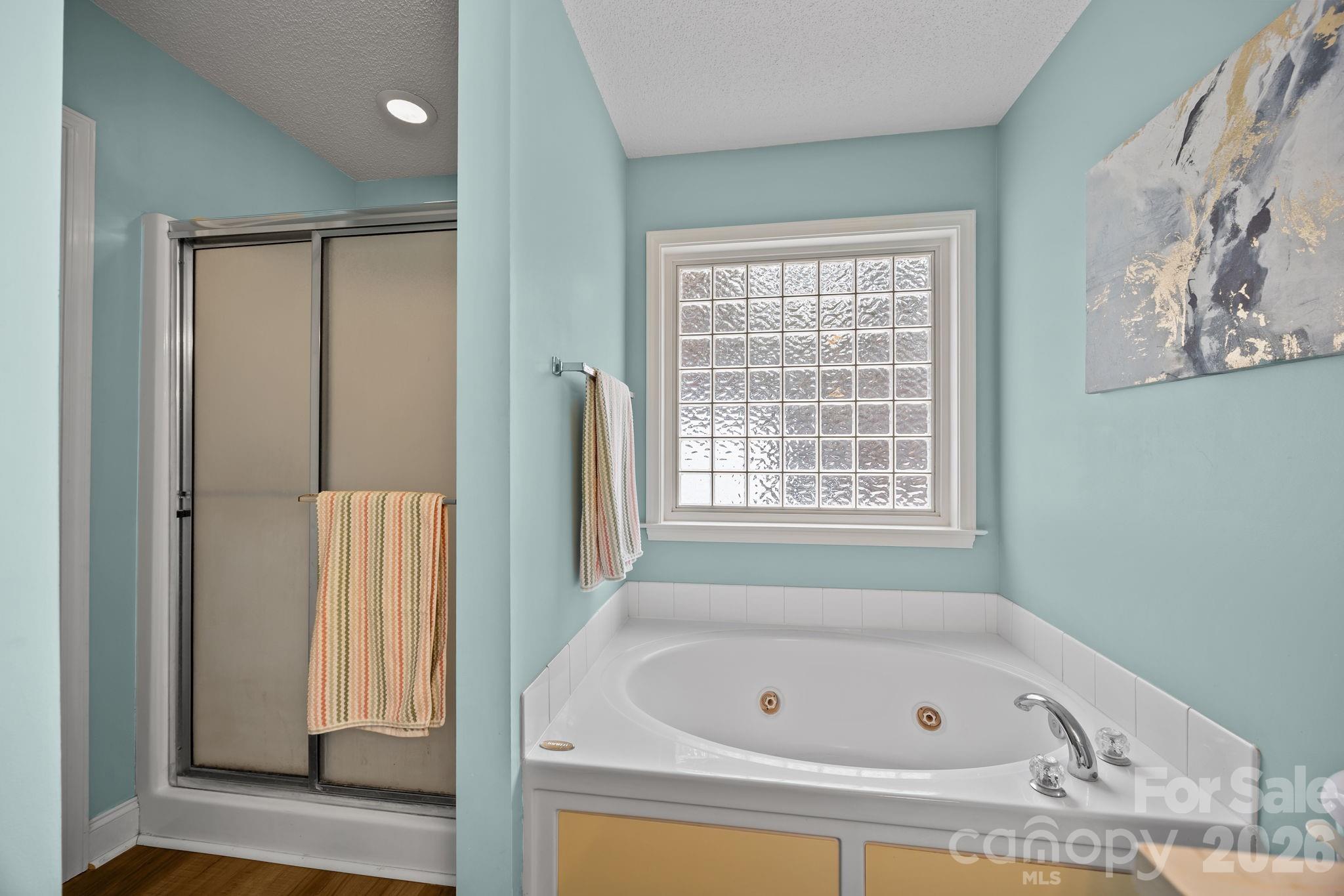 1749 Sells Road Salisbury, NC 28144 - Photo 21 of 47 a bathroom with a tub and shower