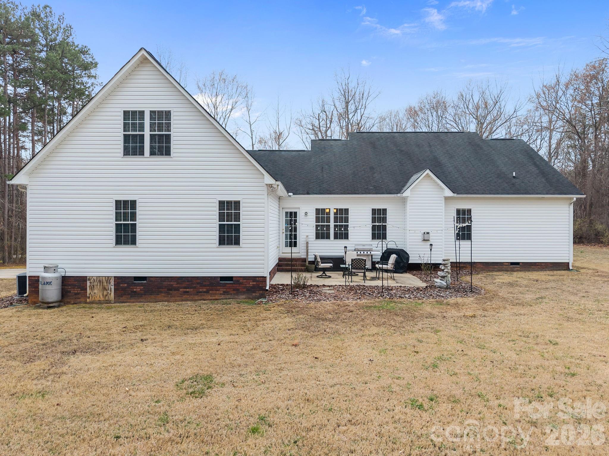 1749 Sells Road Salisbury, NC 28144 - Photo 35 of 47 a view of a house with backyard