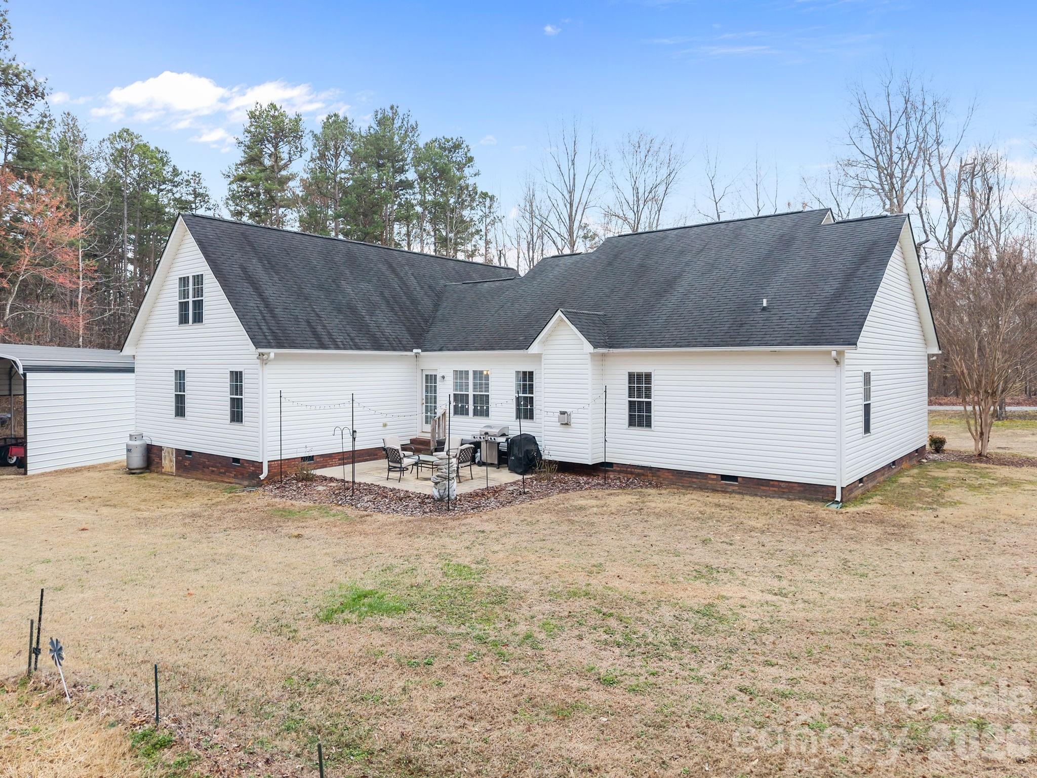 1749 Sells Road Salisbury, NC 28144 - Photo 38 of 47 a view of a house with a yard