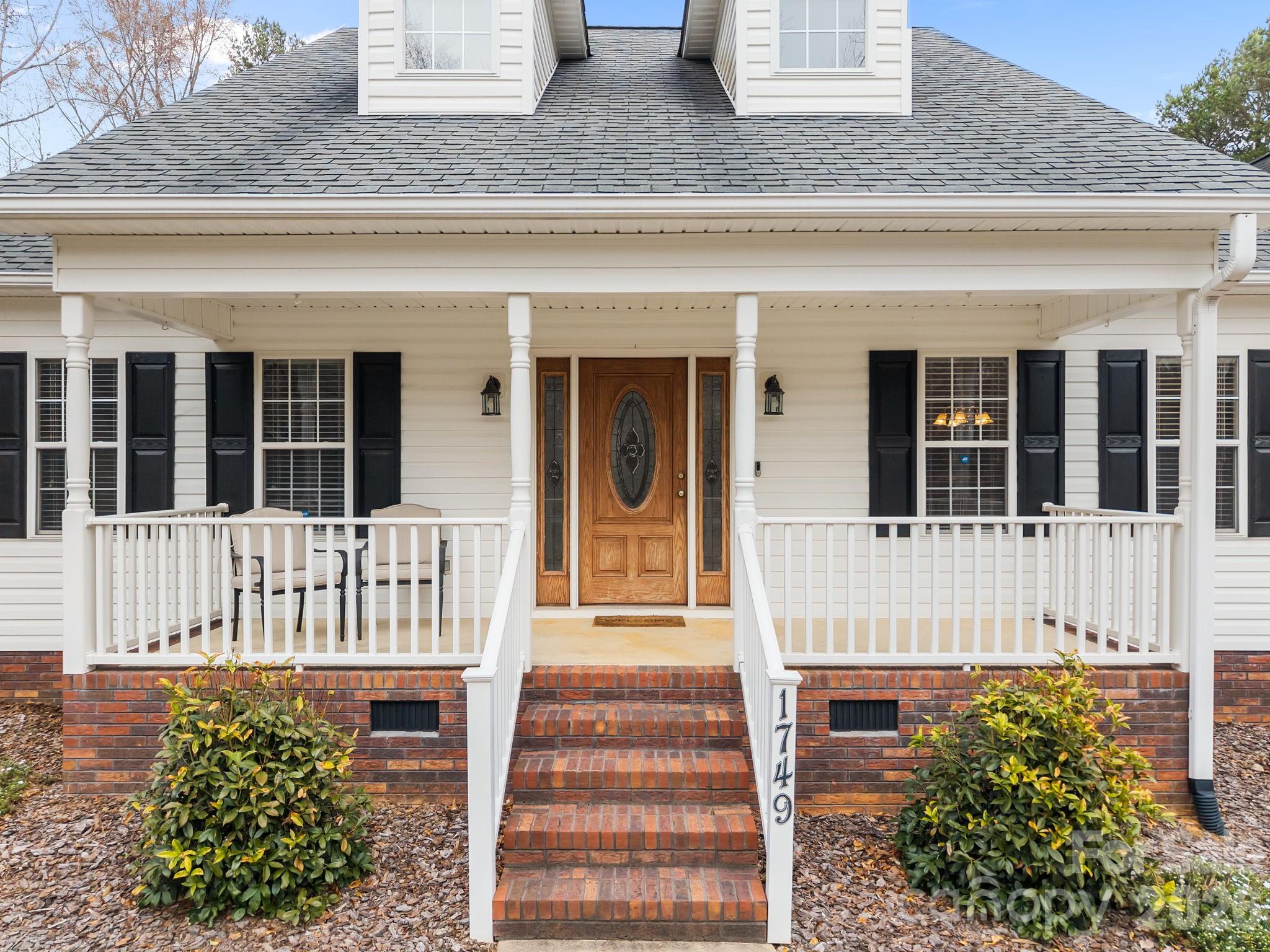 1749 Sells Road Salisbury, NC 28144 - Photo 6 of 47 a front view of a house with a window