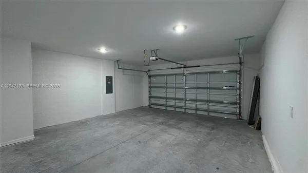 a view of room that has a utility room