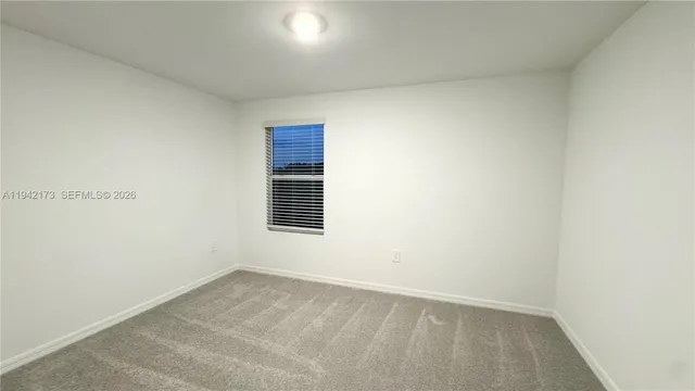 an empty room with a window