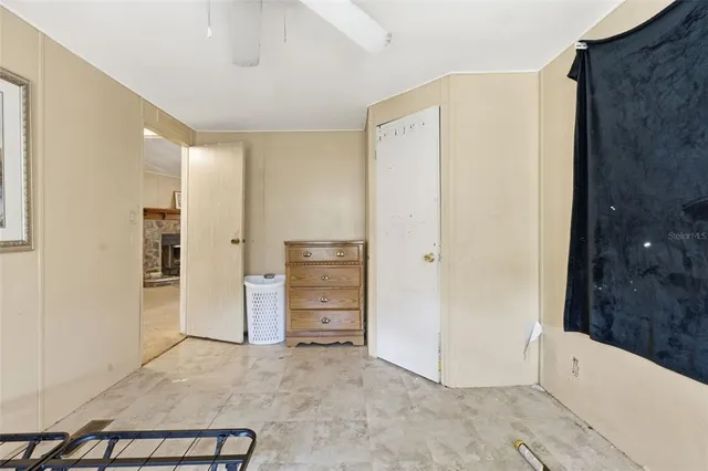 a view of a livingroom with furniture and windows