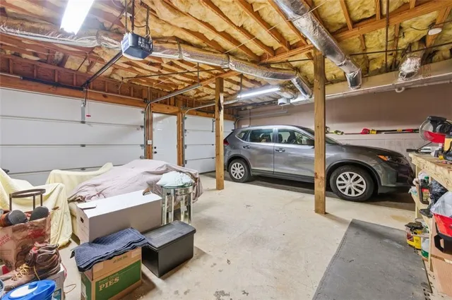 a view of a house with a snow in the background