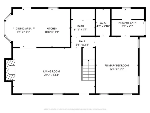 a picture of a bench in front of a gate